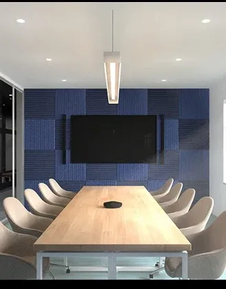 Boardroom with acoustic wall treatment and a long table